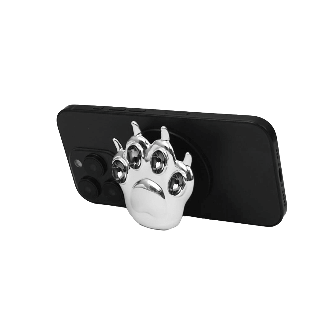 GEM CAT PAW phone grip with black or silver cat paw design, adorned with Swarovski crystals in black, white, or pink.