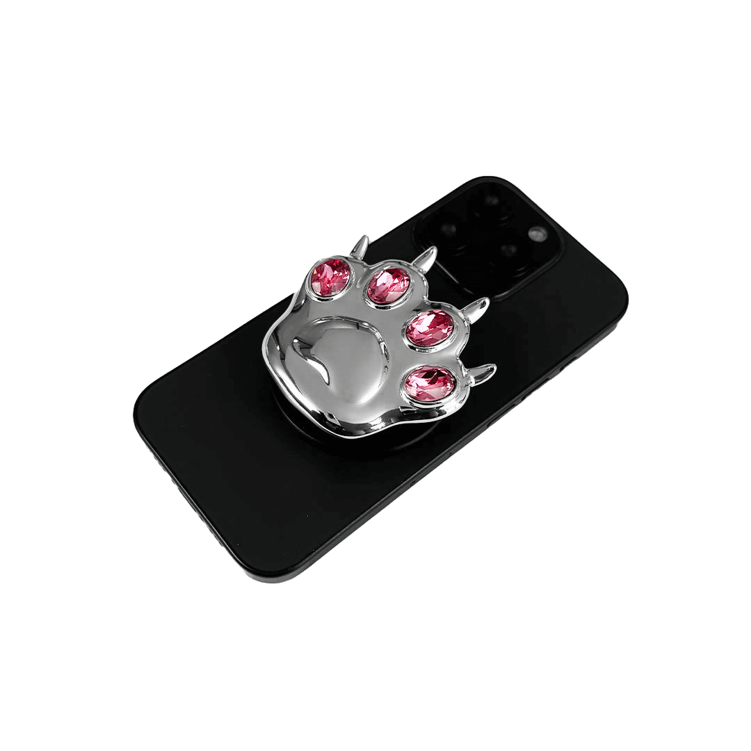 GEM CAT PAW phone grip with black or silver cat paw design, adorned with Swarovski crystals in black, white, or pink.