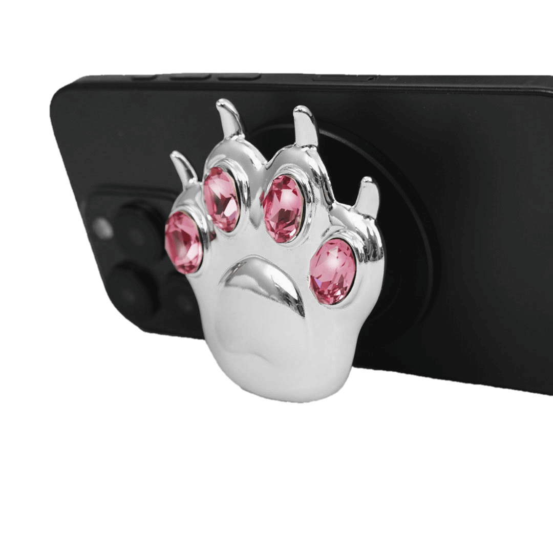 GEM CAT PAW phone grip with black or silver cat paw design, adorned with Swarovski crystals in black, white, or pink.