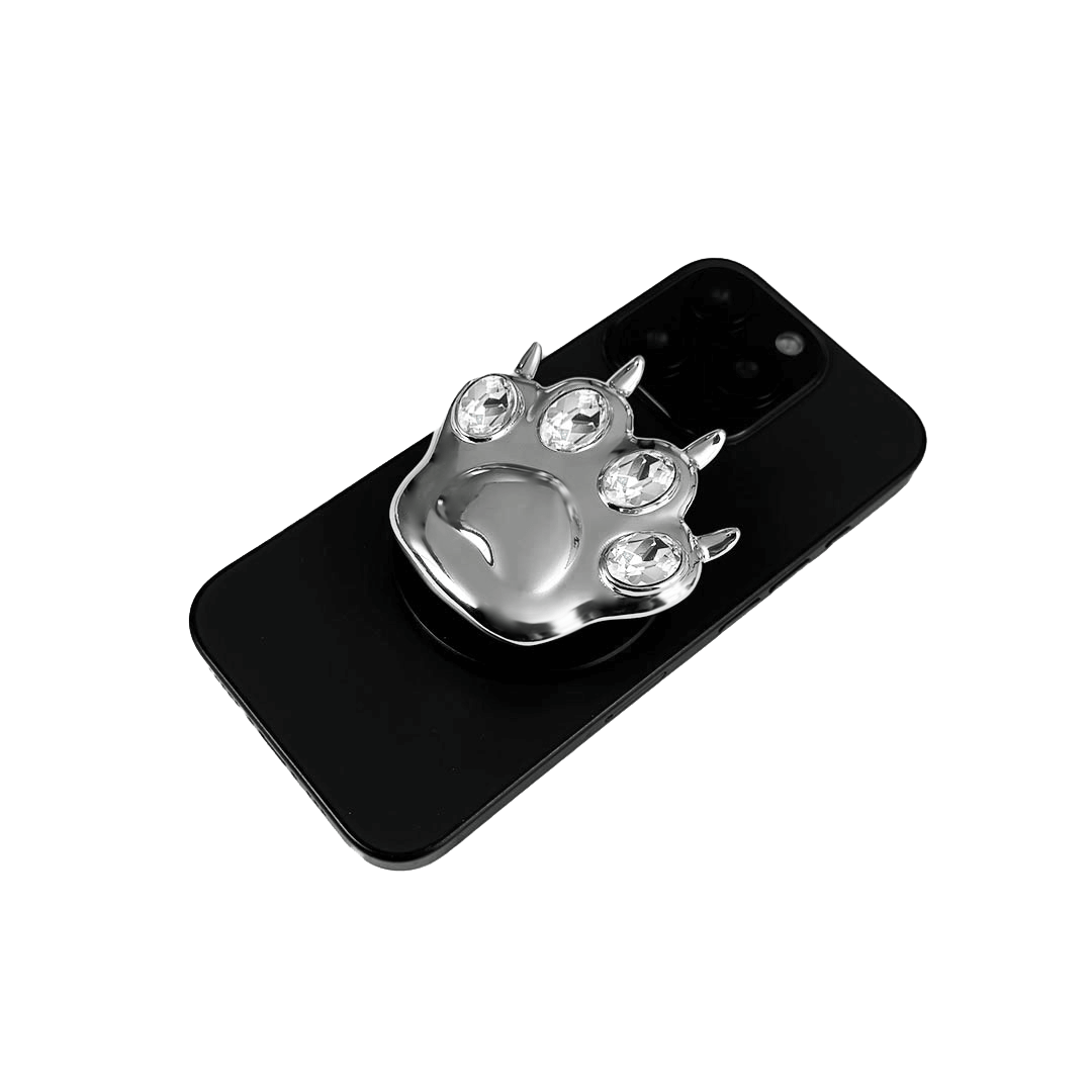 GEM CAT PAW phone grip with black or silver cat paw design, adorned with Swarovski crystals in black, white, or pink.