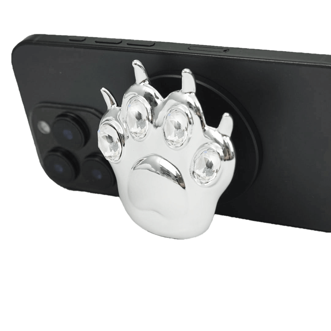 GEM CAT PAW phone grip with black or silver cat paw design, adorned with Swarovski crystals in black, white, or pink.