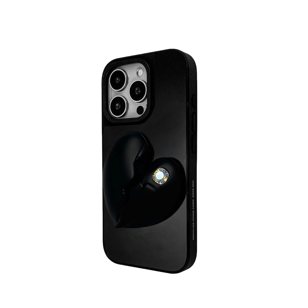 3D silver, pink, red and black metallic iPhone case featuring a cracked heart design with smooth chrome finish and a single embedded gem.