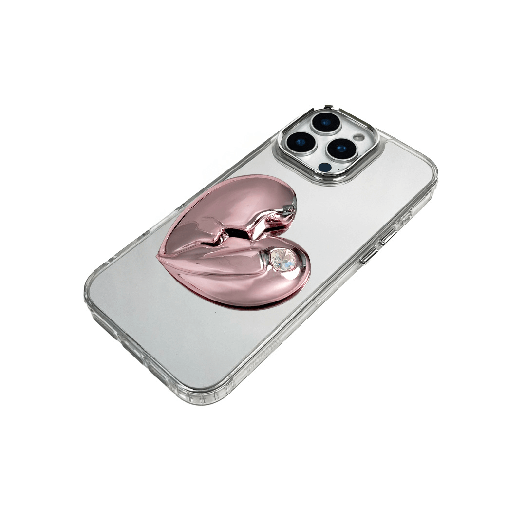 3D silver, pink, red and black metallic iPhone case featuring a cracked heart design with smooth chrome finish and a single embedded gem.