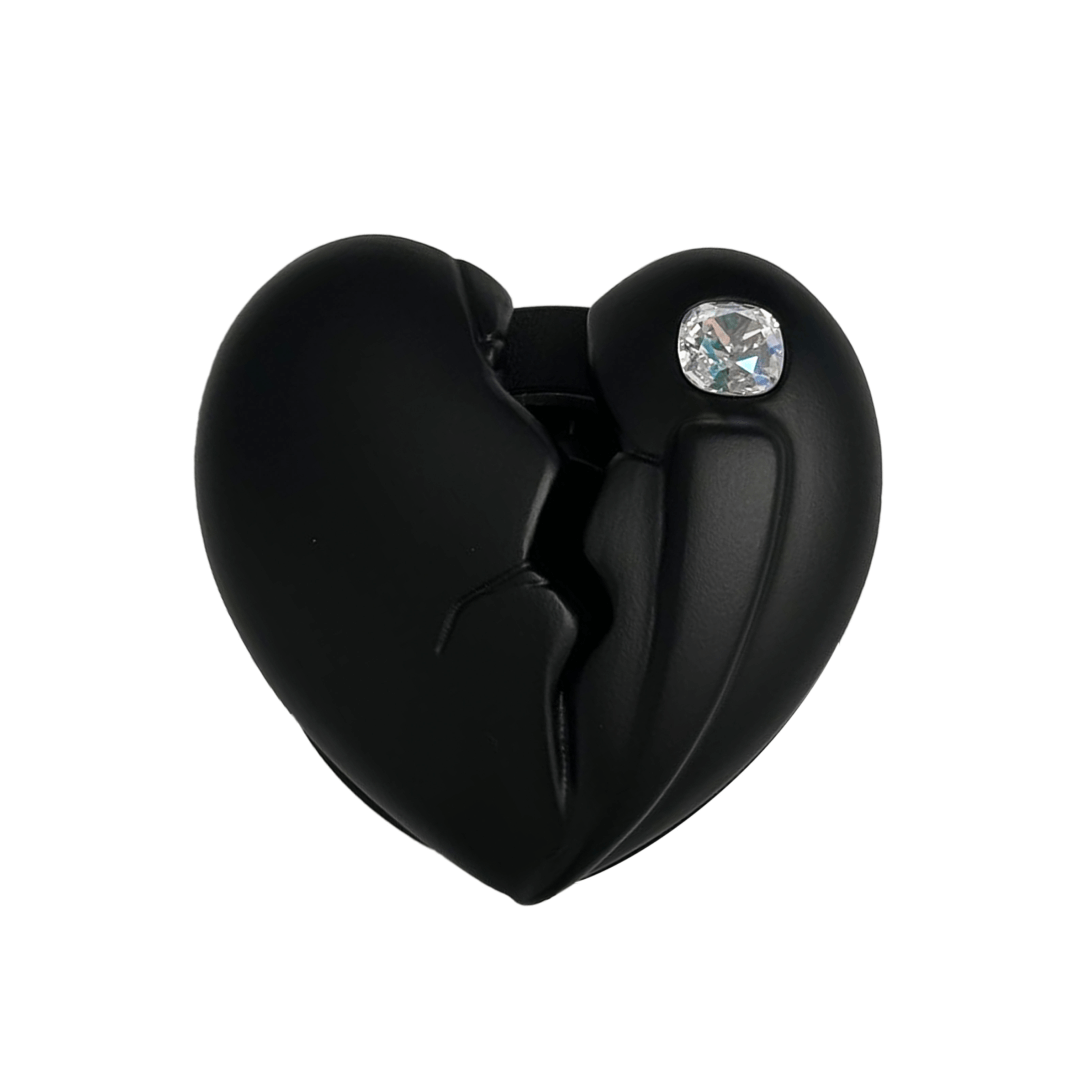 3D silver, pink, red and black metallic Phone grip featuring a cracked heart design with smooth chrome finish and a single embedded gem.