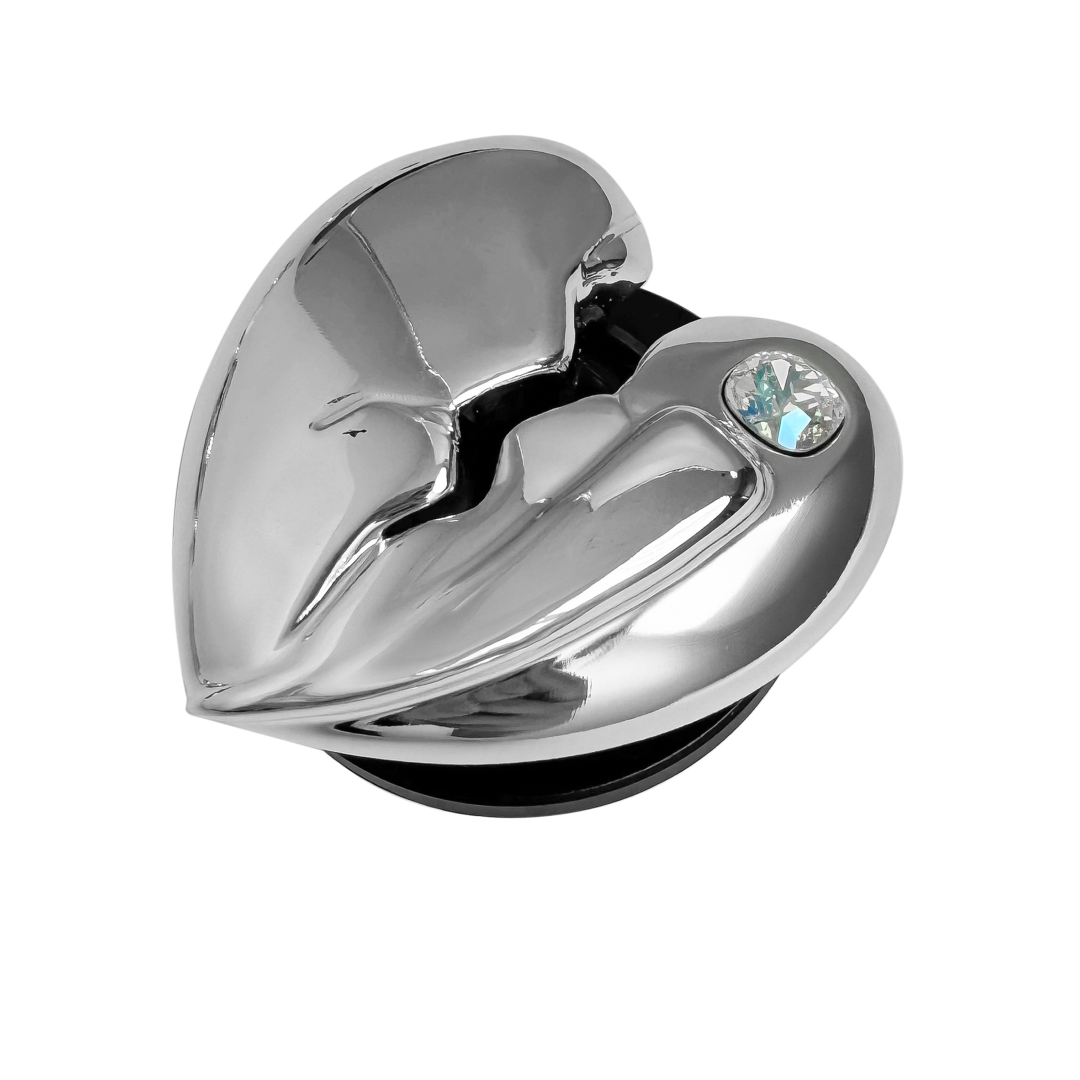 3D silver, pink, red and black metallic Phone grip featuring a cracked heart design with smooth chrome finish and a single embedded gem.