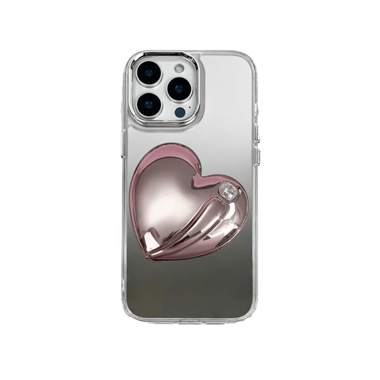 Metallic silver, pink, red, black iPhone case with a large sculpted heart in 3D, featuring a shiny chrome finish and a single gem-like detail.