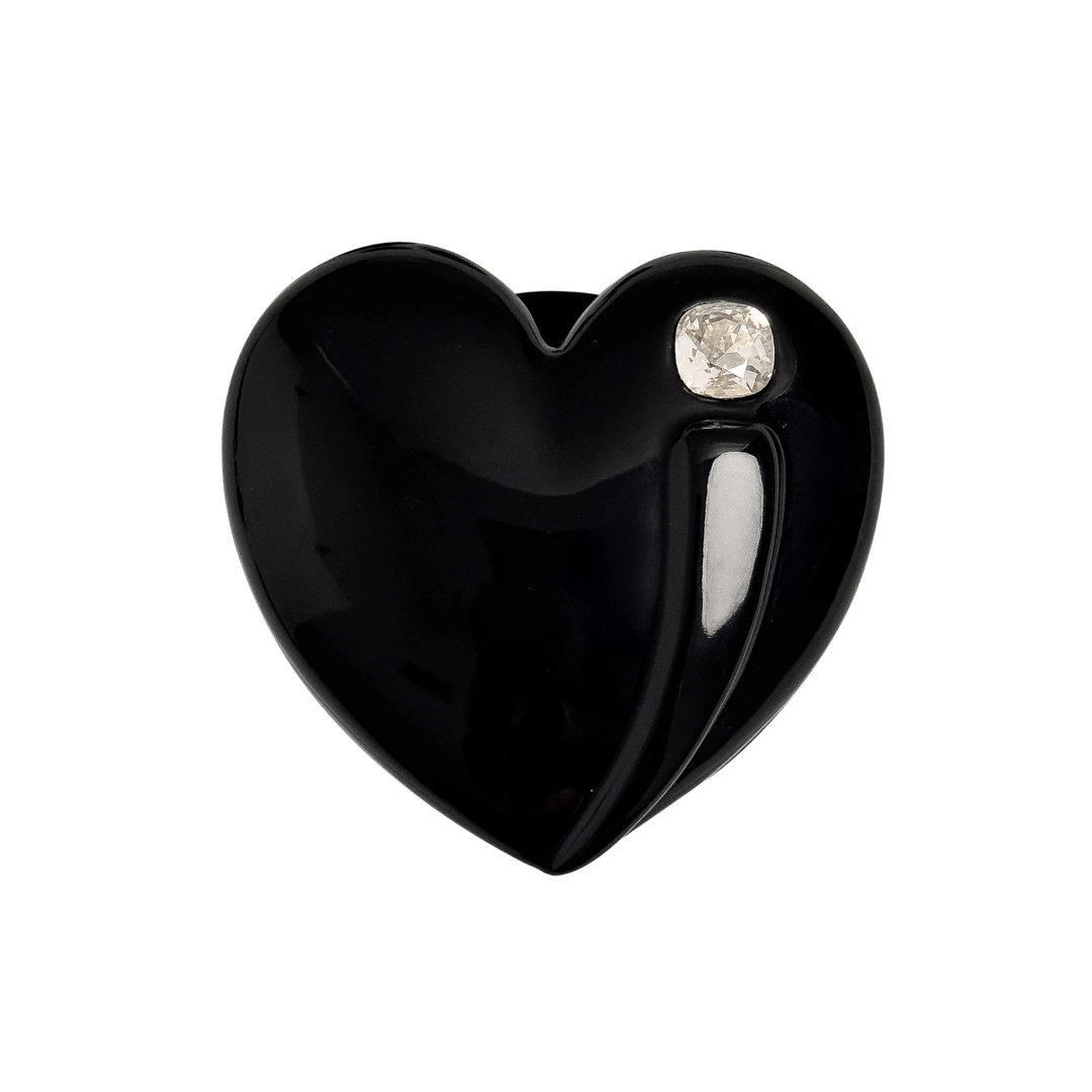 Metallic silver, pink, red, black Phone grip with a large sculpted heart in 3D, featuring a shiny chrome finish and a single gem-like detail.