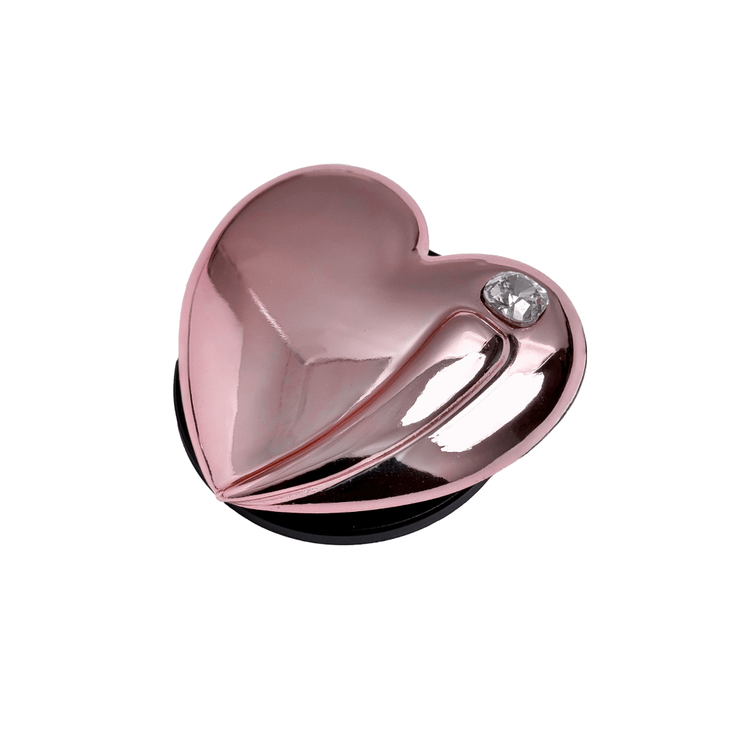 Metallic silver, pink, red, black Phone grip with a large sculpted heart in 3D, featuring a shiny chrome finish and a single gem-like detail.