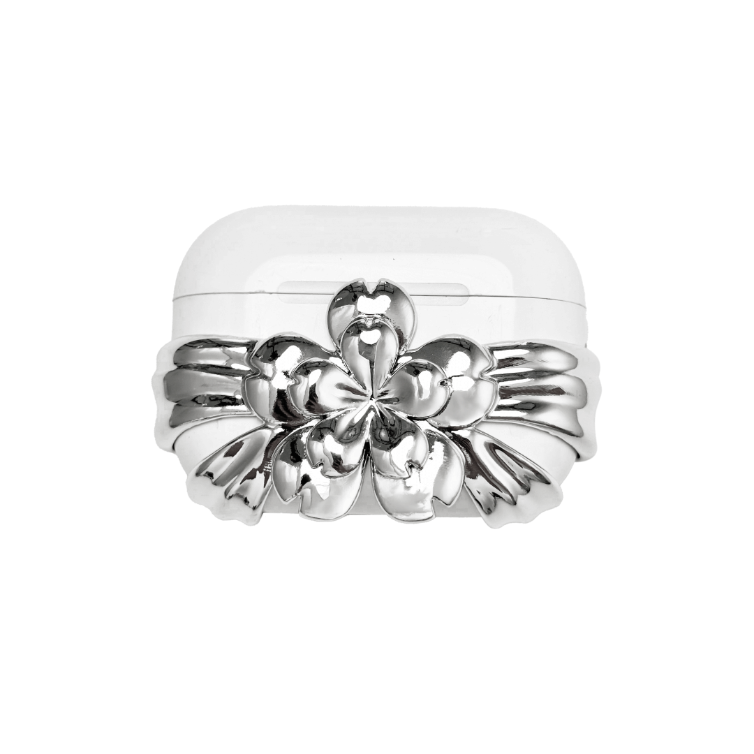 AirPods case cover decorated with a multi-petal cherry blossom in pink or silver, adding a soft and elegant floral accent to a sleek protective design.